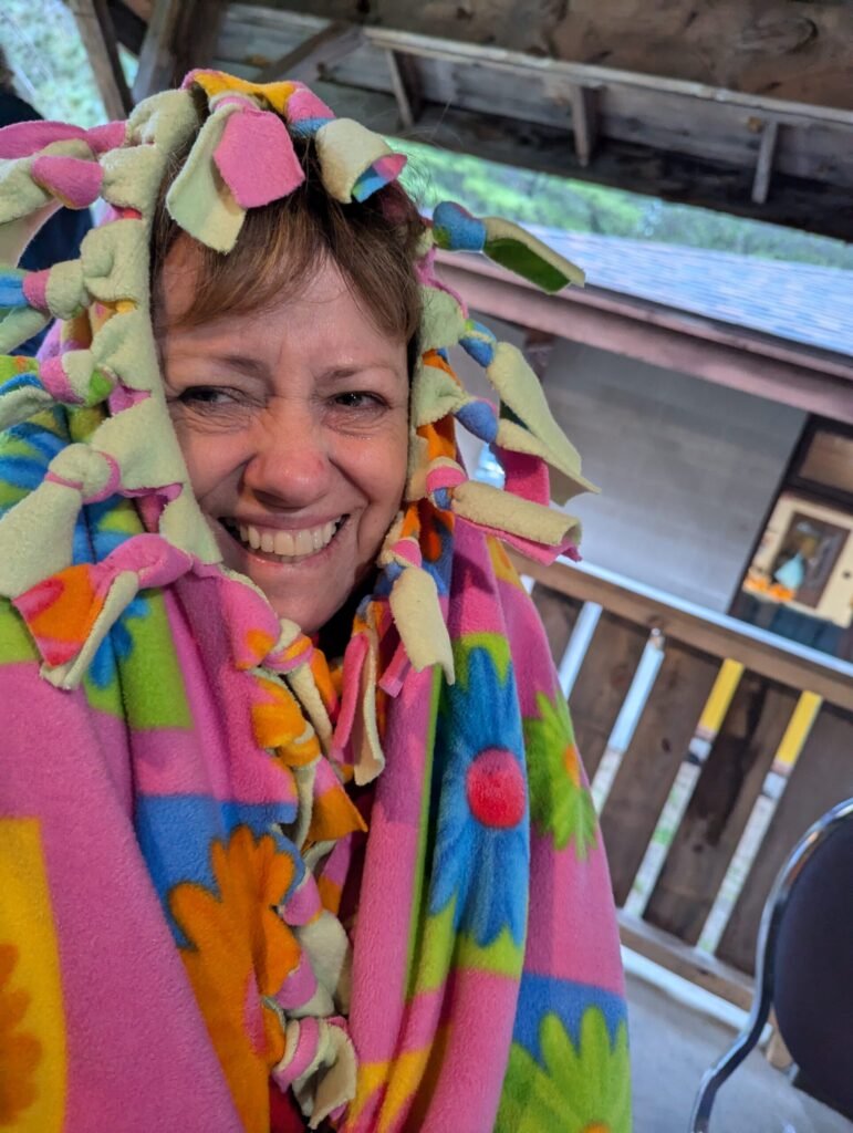 Woman embracing comfort at a wellness retreat for women