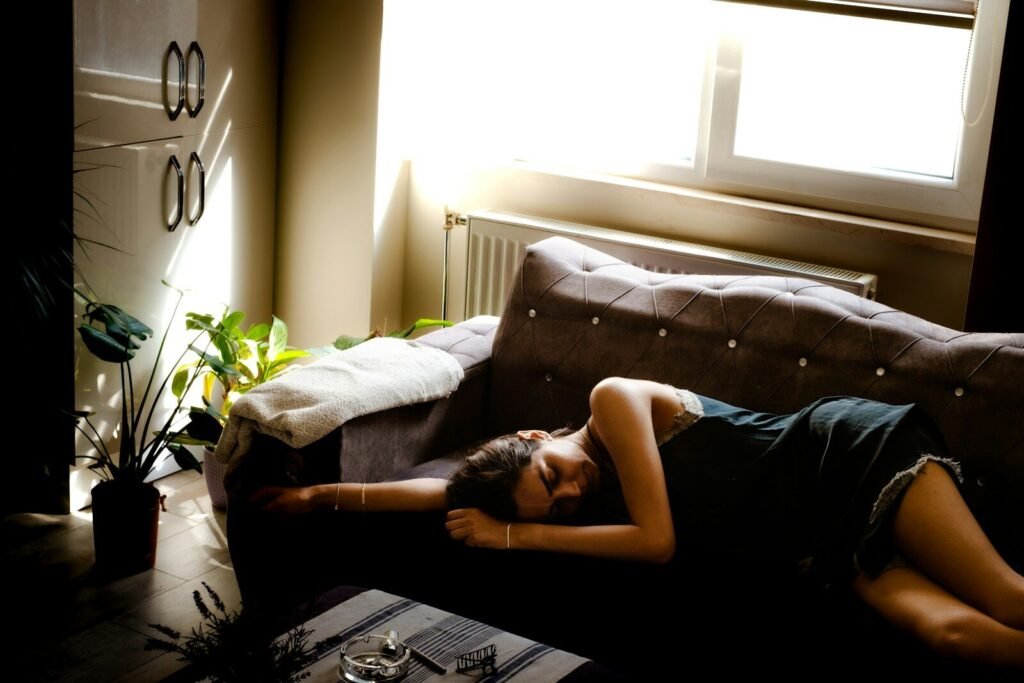 a woman lying on a couch