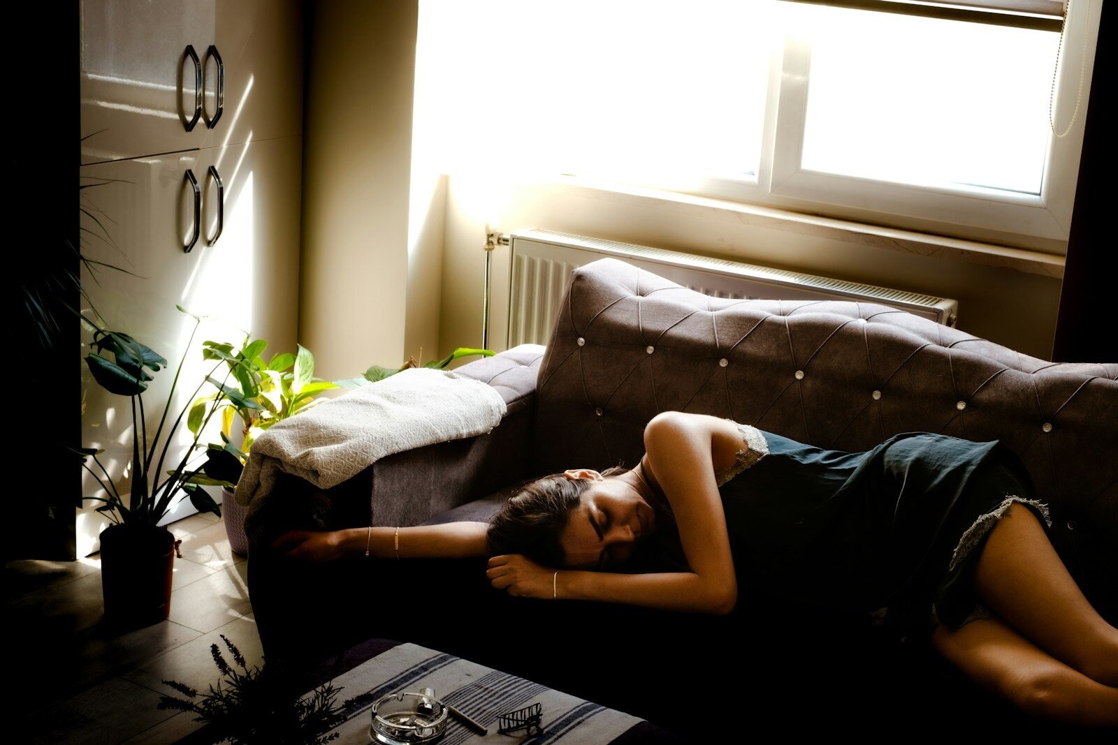 a woman lying on a couch